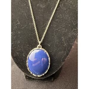 Xiomara Castro Branded reversible necklace blue acrylic pendant and silver toned